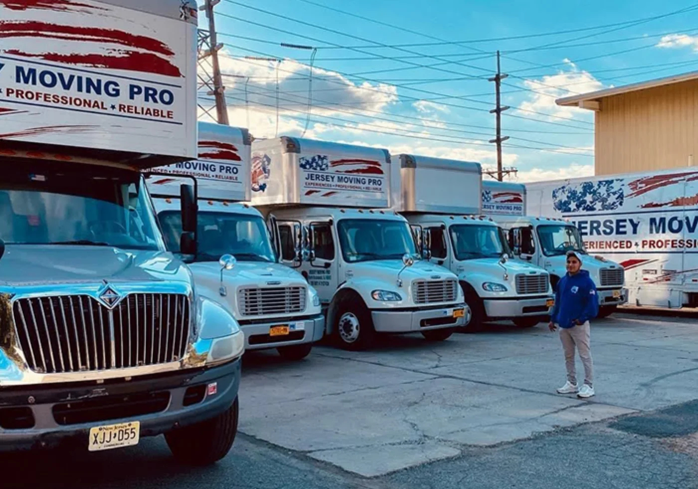 Jersey Moving Pro crew and branded trucks